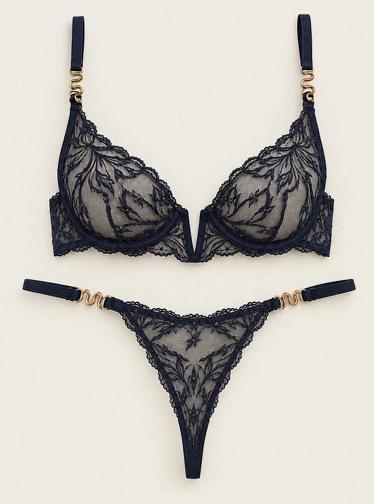 Bleu Nuit laid flat: plunge bra above the thong.